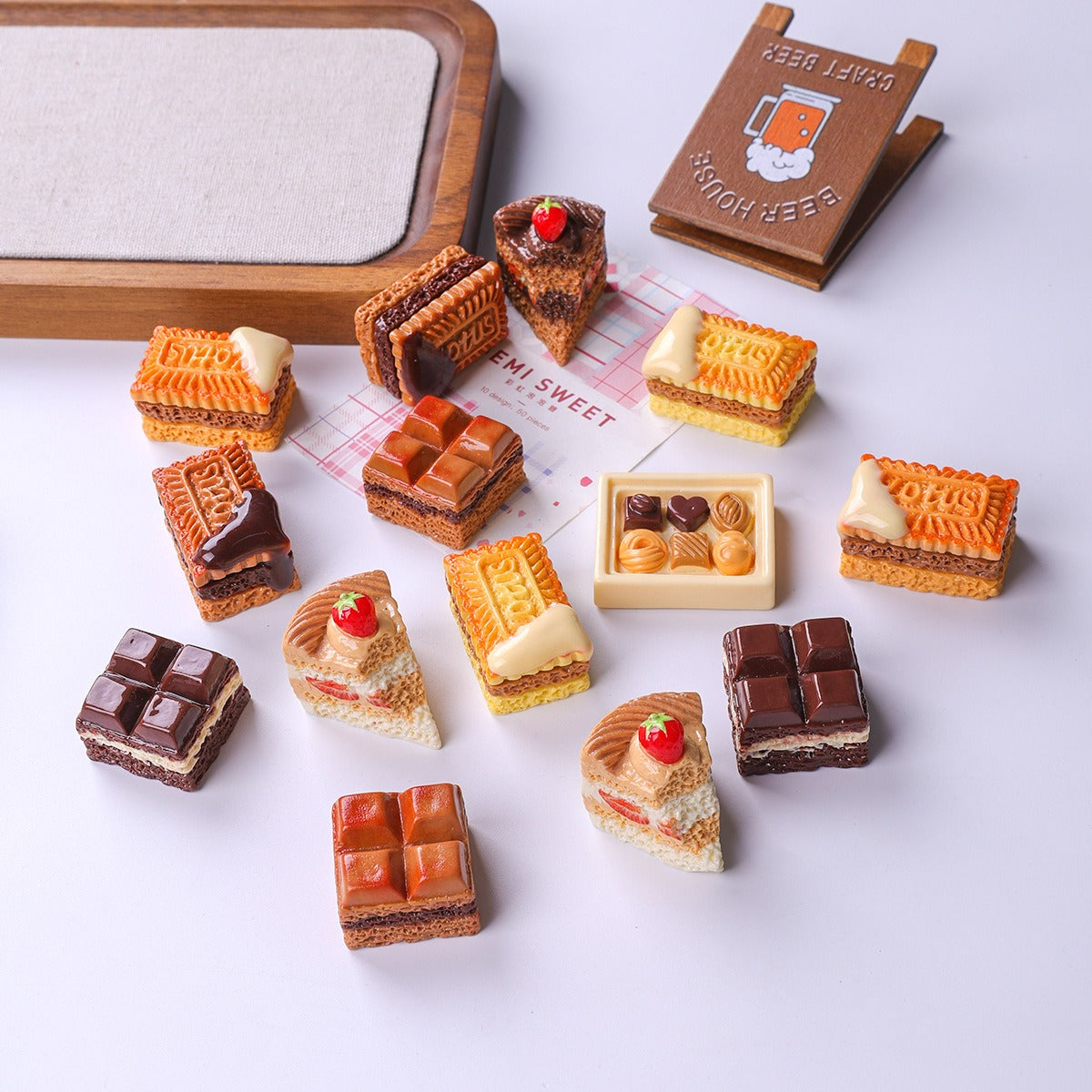 High-quality realistic miniature cakes and cookies